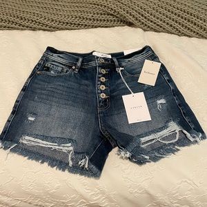 KanCan medium wash, high rise distressed shorts